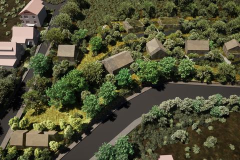 Häuser inmitten von Obstbäumen: So könnte der untere Teil des Areals am ehemaligen Landhaus Baur in Lichtenberg aussehen, wenn das geplante Projekt Realität wird.