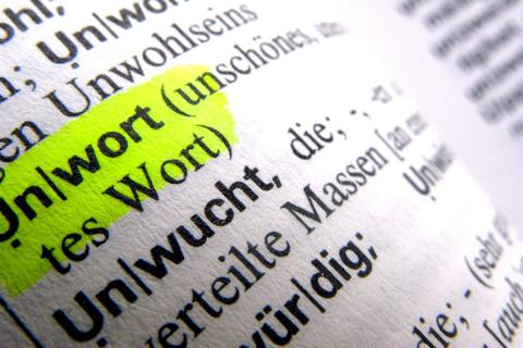 Das Wort "Unwort" in einem Wörterbuch. Foto: dpa